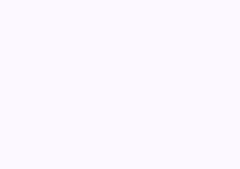 A solid, uniform background in a very pale, soft lavender or light purple hue.